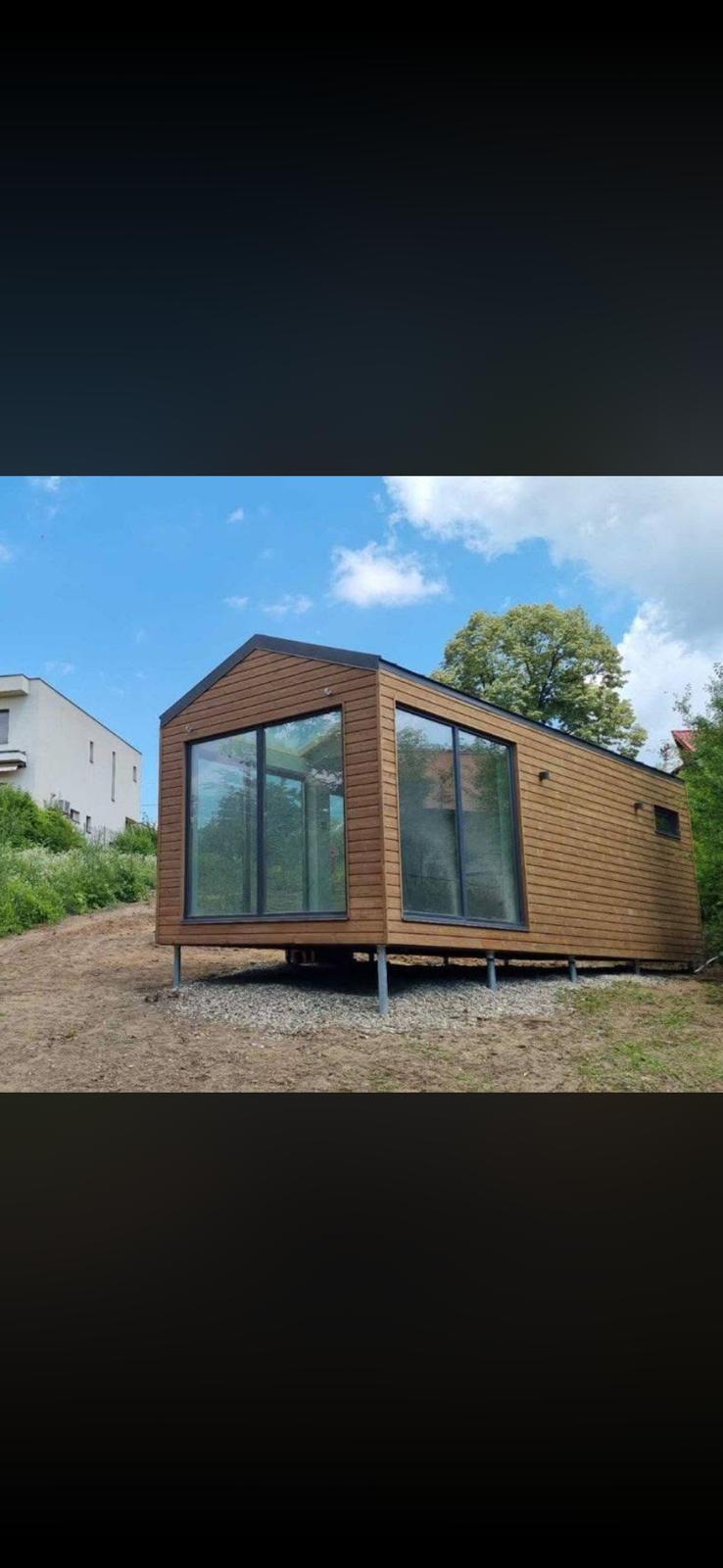 Casa de madera con terraza